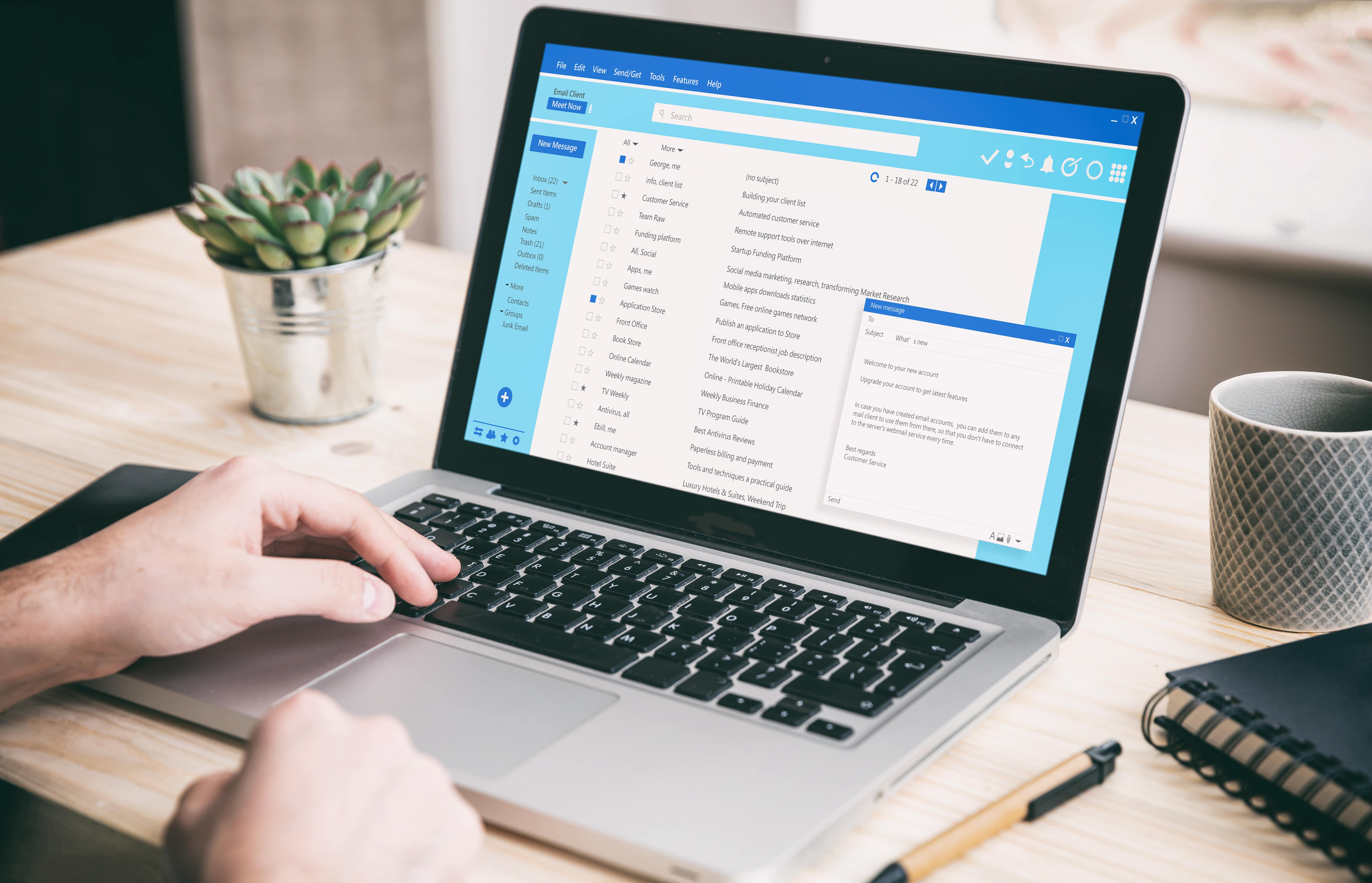 Person reading their emails on a laptop