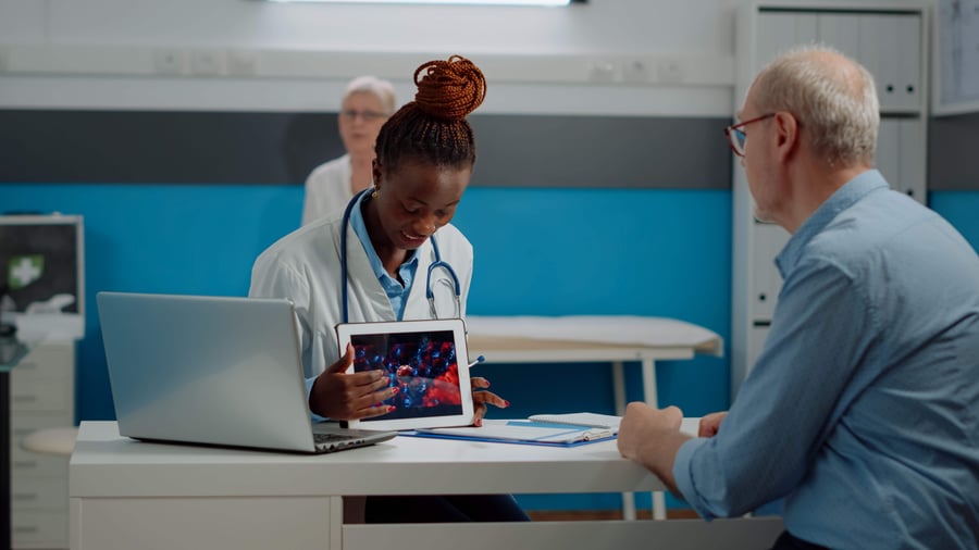 Doctor showing animation to patient