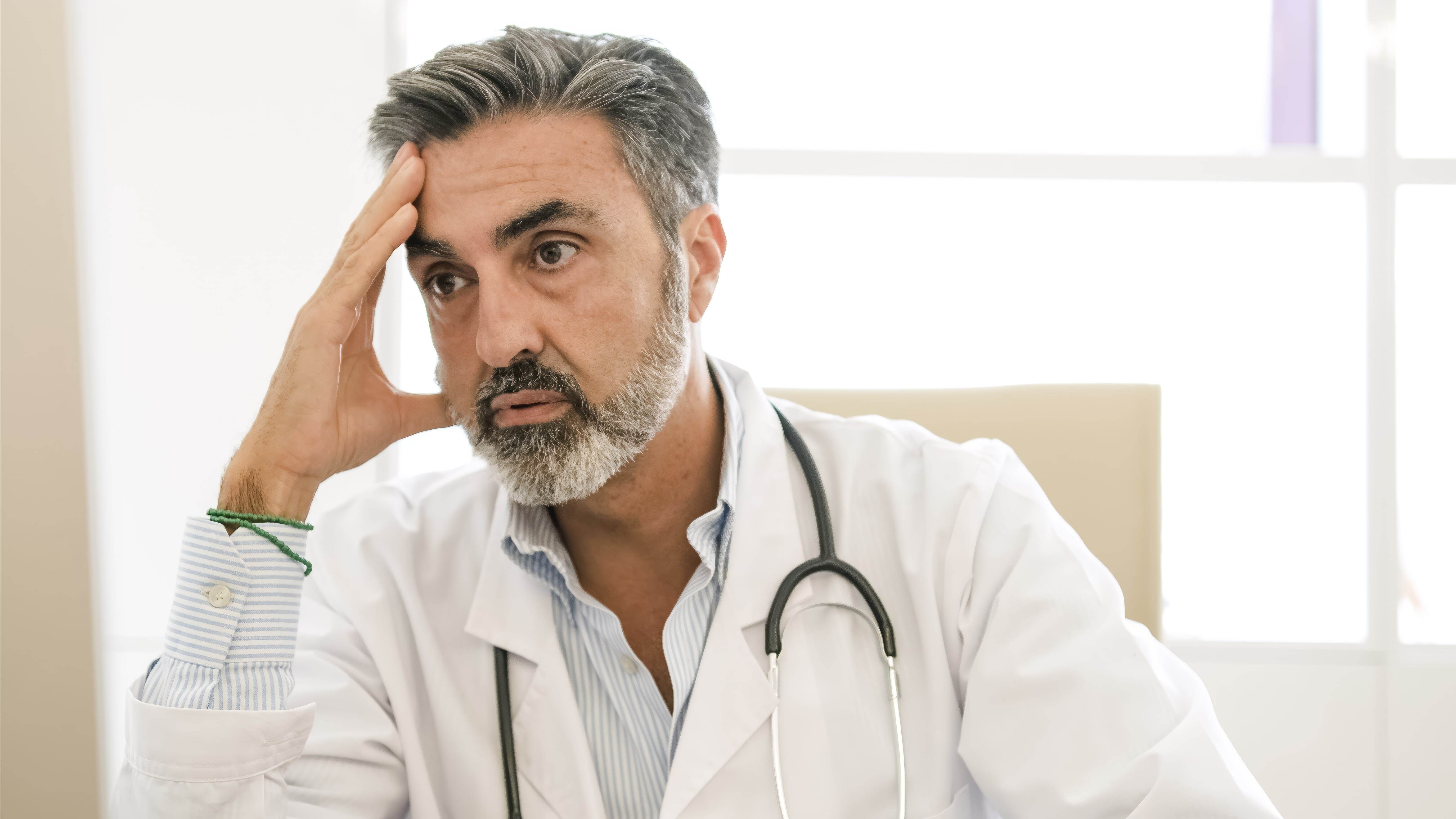 A confused looking doctor