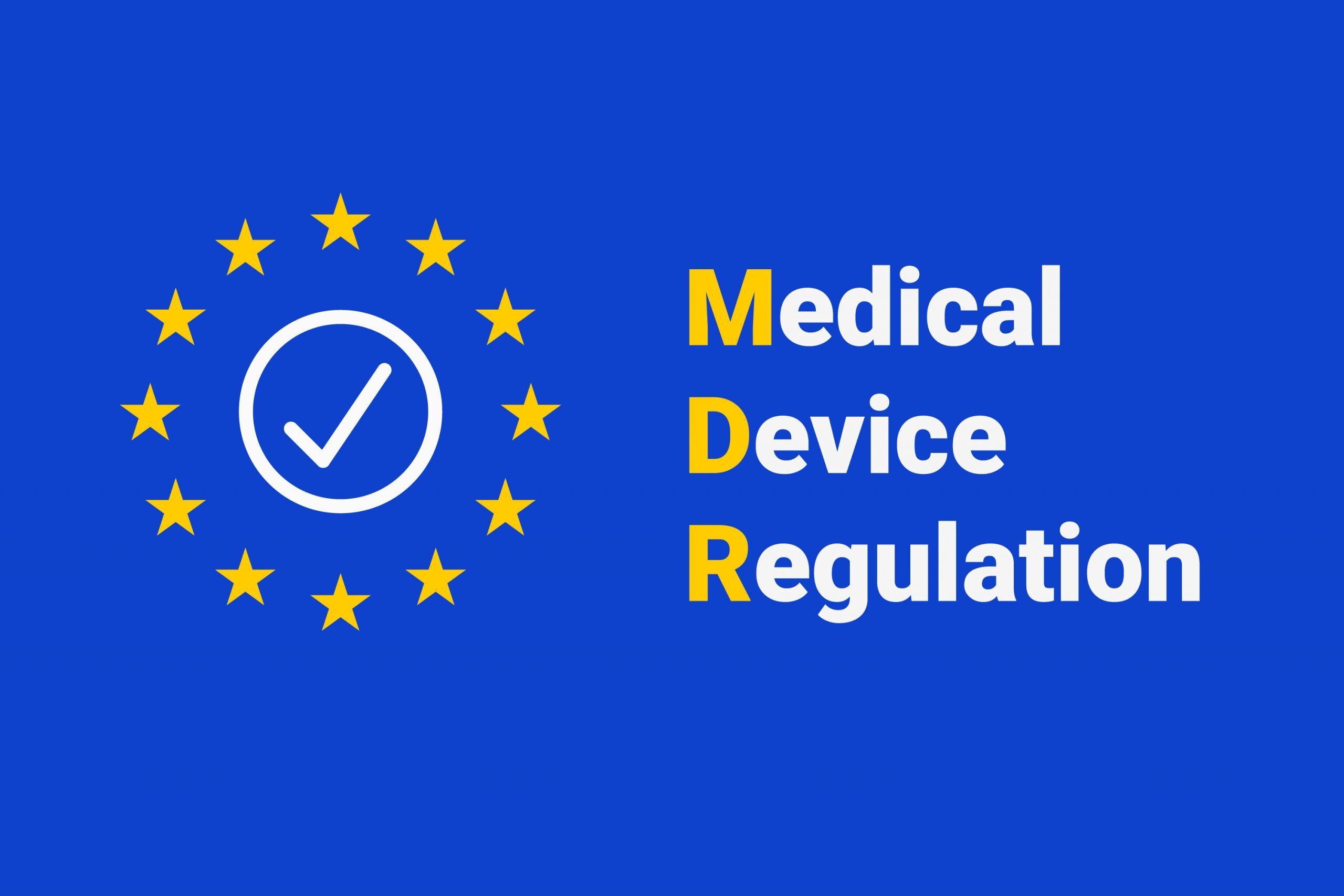 EU medical device regulation on blue background with stars.